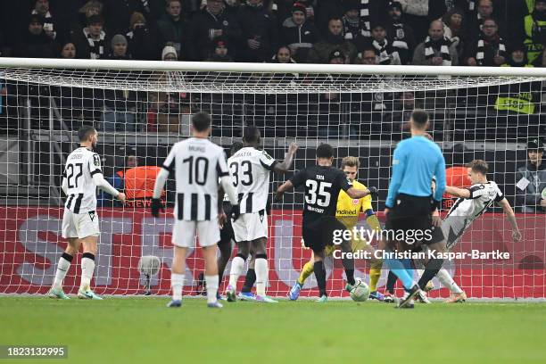 Tomasz Kedziora of PAOK FC scores the team's first goal during the UEFA Europa Conference League match between Eintracht Frankfurt and PAOK FC at...