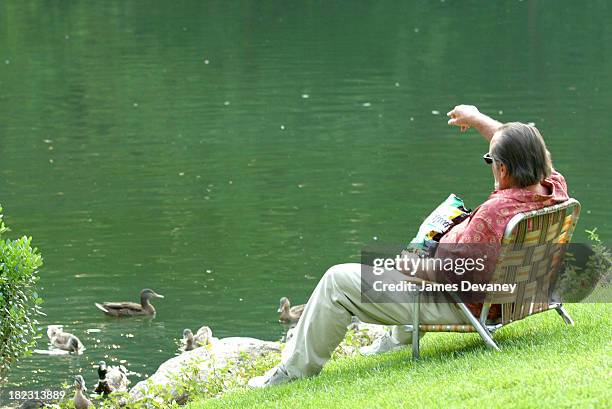 Jack Nicholson feeding ducks during Jack Nicholson, Adam Sandler, and Marisa Tomei on Location for Anger Management at Central Park in New York City,...