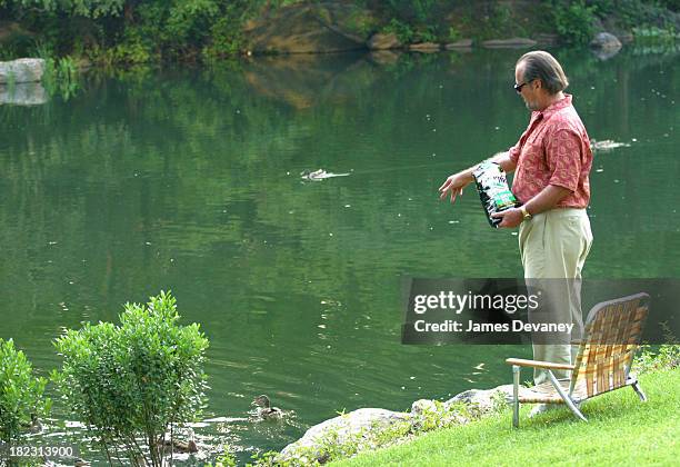 Jack Nicholson feeding ducks during Jack Nicholson, Adam Sandler, and Marisa Tomei on Location for Anger Management at Central Park in New York City,...