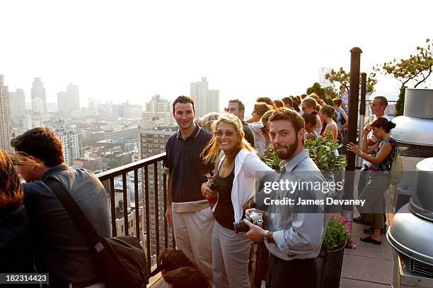 Fans of the Dave Matthews Band gather atop a midtown apartment building overlooking the Ed Sullivan Theatre where the band performed.