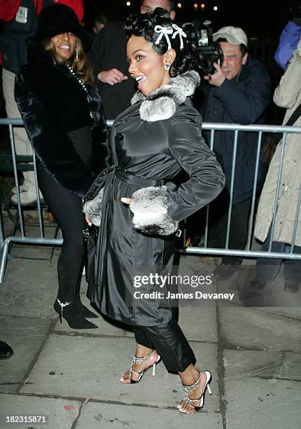 Lil Kim during Olympus Fashion Week Fall 2005 - Sweetface by Jennifer Lopez and Andy Hilfiger - Departures at The Tent, Bryant Park in New York City,...