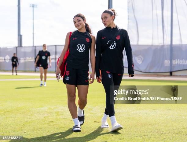 Sophia Smith and Trinity Rodman of the United States arrive at the field before USWNT training at Florida Blue Training Center on November 30, 2023...