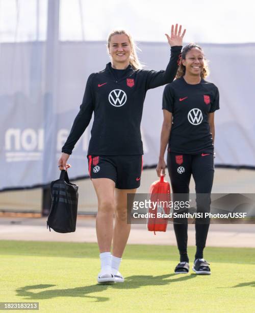 Lindsey Horan and Casey Krueger of the United States arrive at the field before USWNT training at Florida Blue Training Center on November 30, 2023...