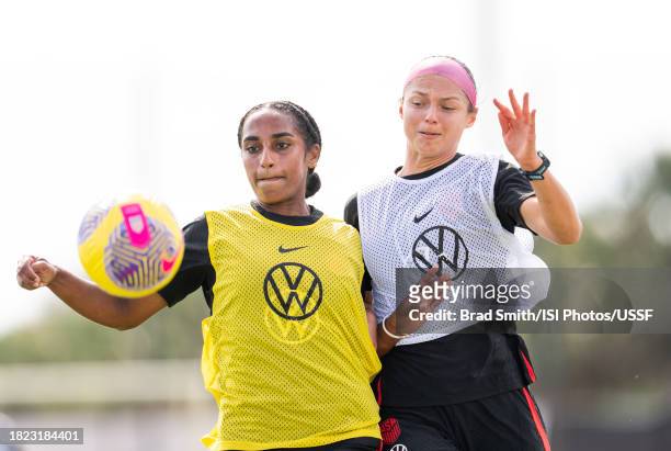 Naomi Girma defends Ashley Hatch of the United States during USWNT training at Florida Blue Training Center on November 30, 2023 in Fort Lauderdale,...