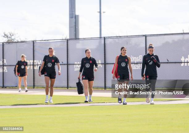 Vignola, Sam Coffey, Sophia Smith and Trinity Rodman of the United States arrive at the field before USWNT training at Florida Blue Training Center...