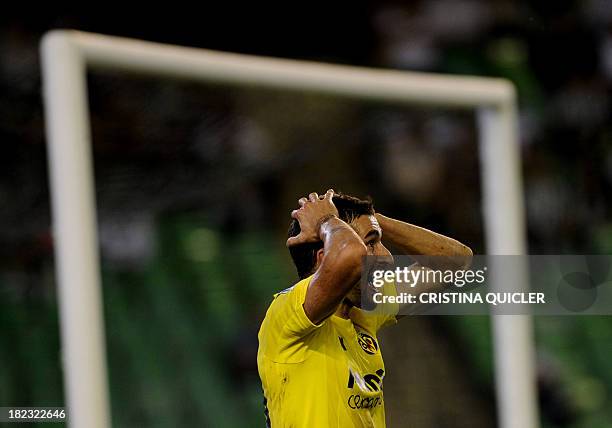 Villarreal's midfielder Cani reacts during the Spanish league football match Real Betis vs Villarreal CF at the Benito Villamarin stadium in Sevilla...