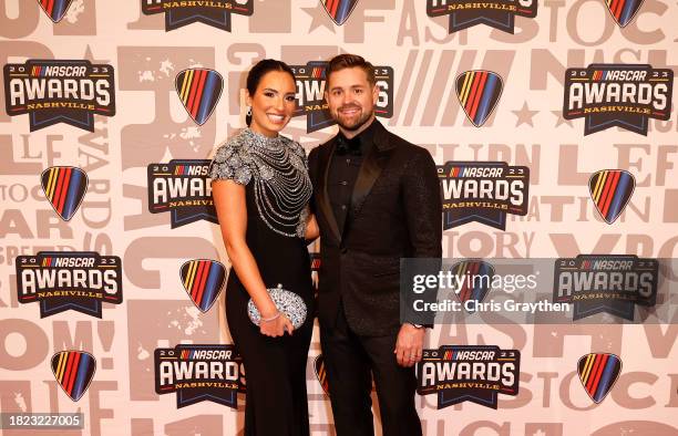 Cup Series driver, Ricky Stenhouse Jr. And wife, Madyson Stenhouse pose for photos on the red carpet prior to the NASCAR Awards and Champion...