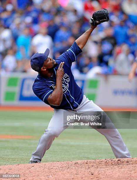 Fernando Rodney of the Tampa Bay Rays celebrates the teams win over the Toronto Blue Jays during MLB game action September 29, 2013 at Rogers Centre...