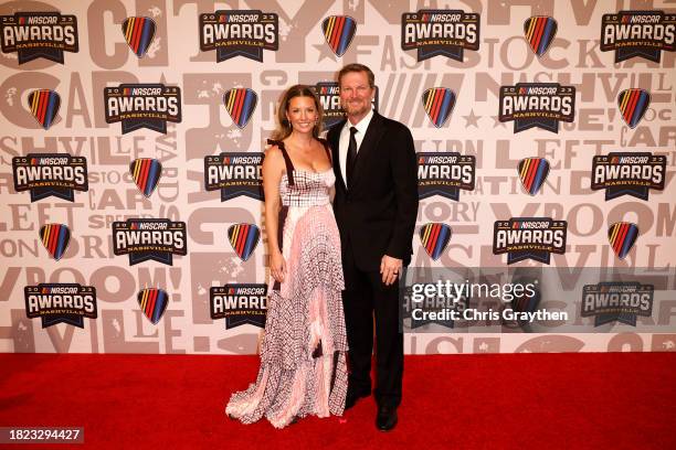 Hall of Famer Dale Earnhardt Jr. And his wife Amy Earnhardt pose for photos on the red carpet prior to the NASCAR Awards and Champion Celebration at...