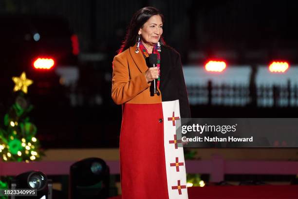 Interior Secretary Deb Haaland speaks during the Lighting Ceremony of the National Christmas Tree in President's Park in the Ellipse of the White...