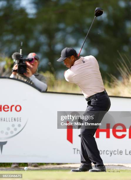 Tiger Woods of the United States plays his shot from the tenth tee during the first round of the Hero World Challenge at Albany Golf Course on...