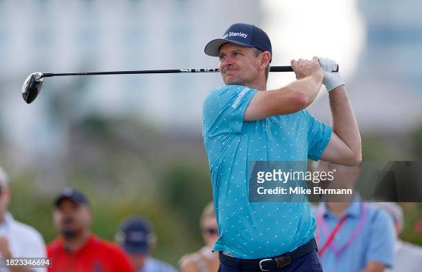 Justin Rose of England plays his shot from the 14th tee during the first round of the Hero World Challenge at Albany Golf Course on November 30, 2023...