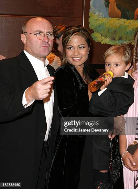 Phil Collins and wife Orianne Cevey and son Nicholas