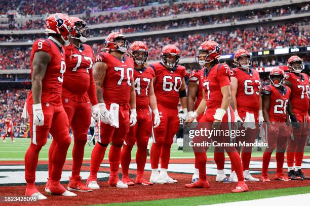 Stroud of the Houston Texans interacts with his team against the Jacksonville Jaguars at NRG Stadium on November 26, 2023 in Houston, Texas.