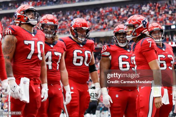 Stroud of the Houston Texans interacts with his team against the Jacksonville Jaguars at NRG Stadium on November 26, 2023 in Houston, Texas.