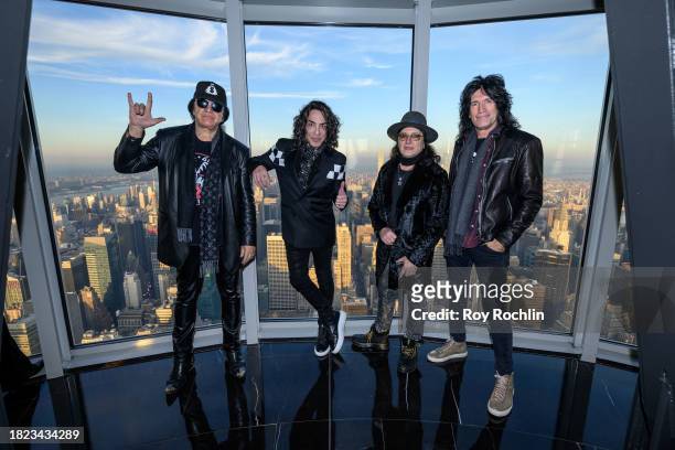 Gene Simmons, Eric Singer, Paul Stanley and Tommy Thayer of KISS pose as they light the Empire State Building in celebration of the band's final show...
