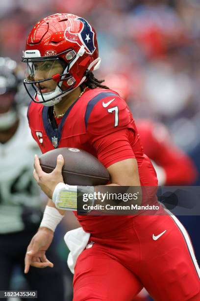 Stroud of the Houston Texans in action against the Jacksonville Jaguars at NRG Stadium on November 26, 2023 in Houston, Texas.