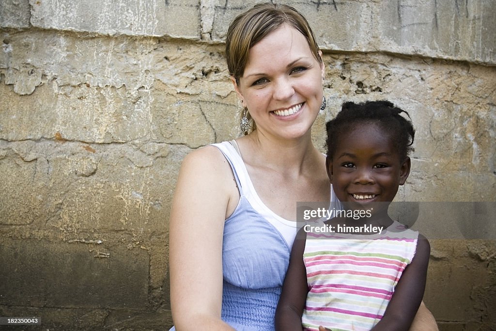 American Woman With African Child