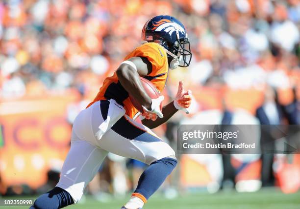 Trindon Holliday of the Denver Broncos runs a kickoff back 105 yards for a touchdown in the first quarter during a game against the Philadelphia...