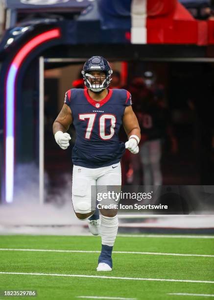 Houston Texans center Juice Scruggs enters the field during the football game between Denver Broncos and Houston Texans at NRG Stadium on December 3,...