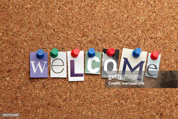 the word 'welcome' on cork notice board. - welcome sign stock pictures, royalty-free photos & images