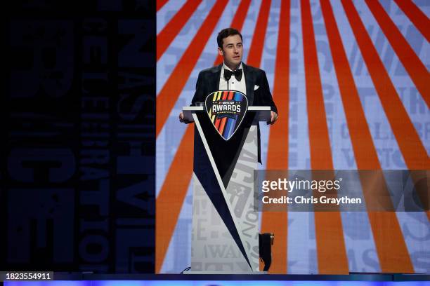 Cup Series Champion, Ryan Blaney speaks onstage during the NASCAR Awards and Champion Celebration at the Music City Center on November 30, 2023 in...
