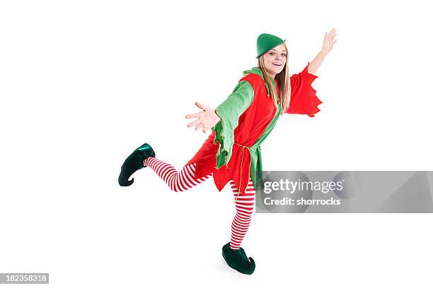 navidad elf baile sobre blanco - pixie fotografías e imágenes de stock
