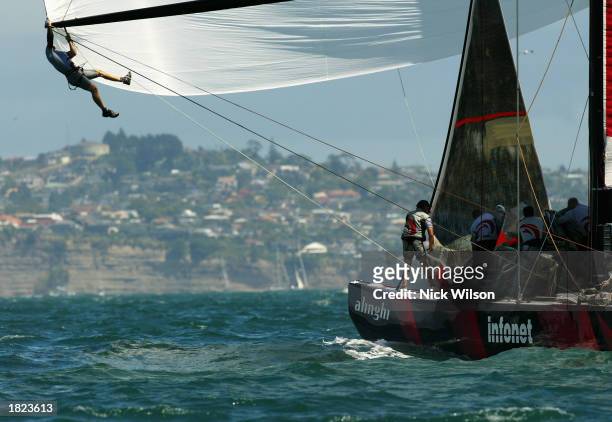 Alinghi Bowman Curtis Blewett works at the end of the Spinaker pole after Race Five of the America's Cup between Team New Zealand and Alinghi of...