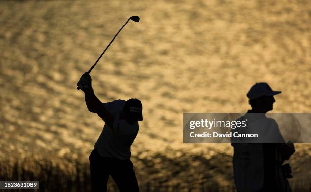 Viktor Hovland of Norway plays his second shot on the 18th hole during the first round of the Hero World Challenge at Albany Golf Course on November...