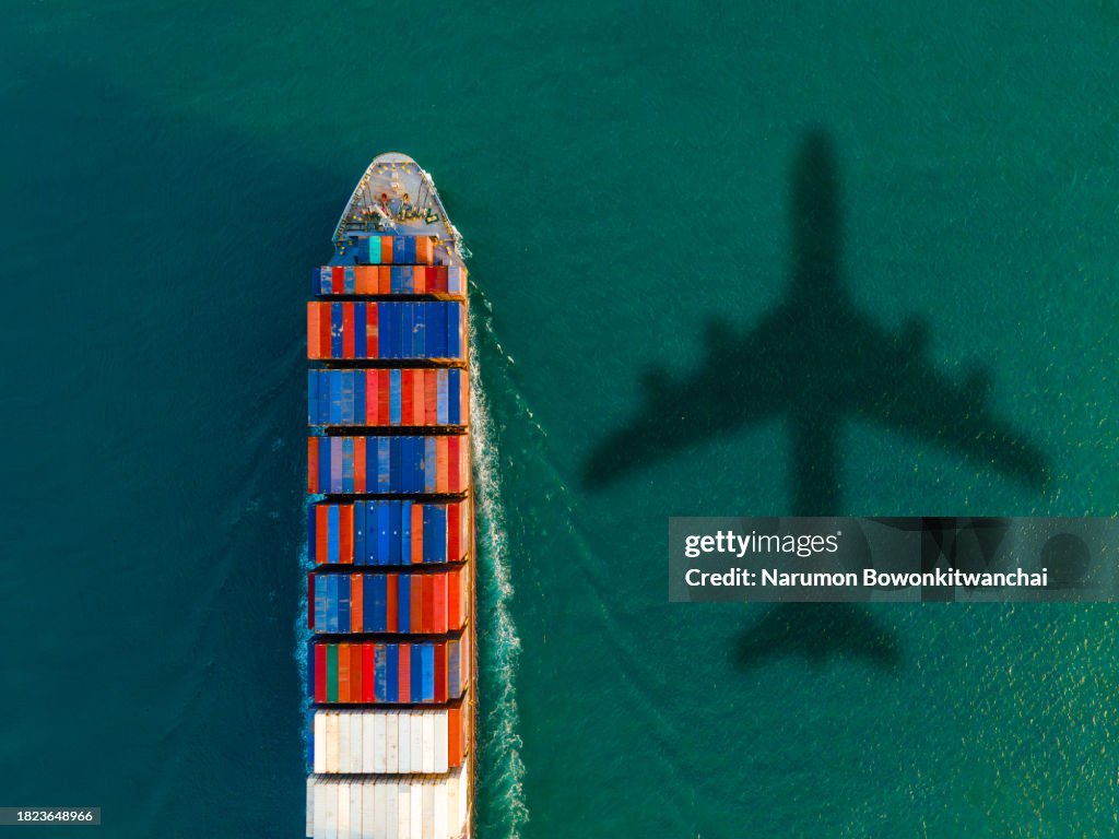 Aerial View of a Cargo Ship in a Thriving Harbor