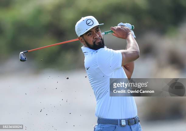 Tony Finau of The United States plays his second shot on the third hole during the first round of the Hero World Challenge at Albany Golf Course on...