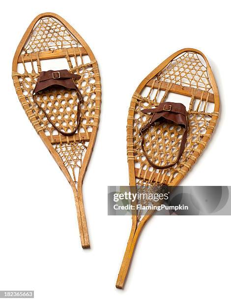 wood snowshoes on white background. - sneeuwschoen stockfoto's en -beelden