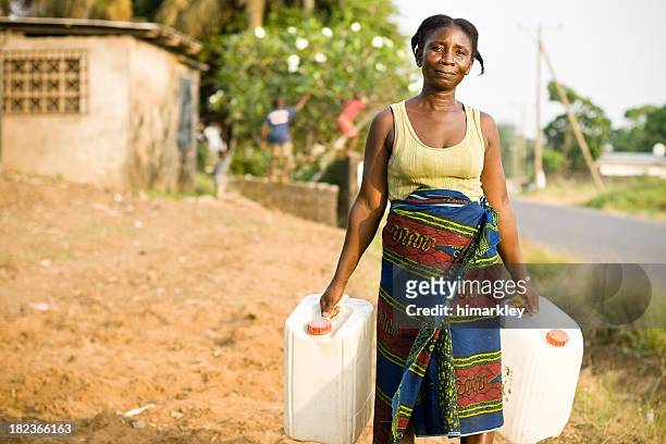 african woman - poor africans stock pictures, royalty-free photos & images