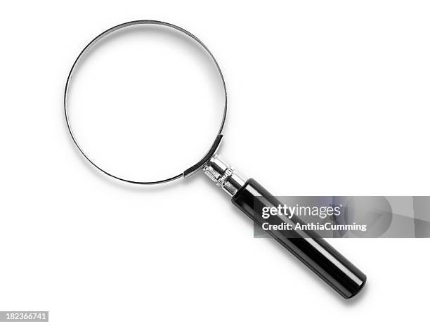 magnifying glass on white background with clipping path - vergrootglas stockfoto's en -beelden