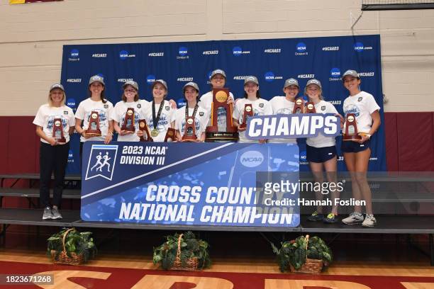 The Carleton Knights celebrate their championship during the Division III Men's and Women's Cross Country Championship held on the campus of Big...