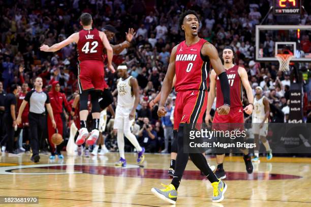 Josh Richardson of the Miami Heat reacts during the fourth quarter of the game against the Indiana Pacers at Kaseya Center on November 30, 2023 in...