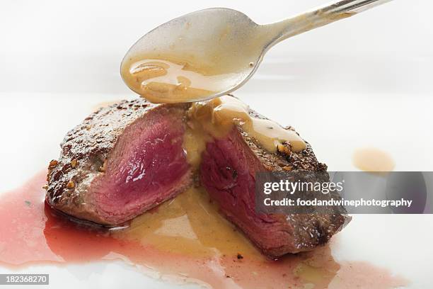 venison steak - peppercorn sauce stock pictures, royalty-free photos & images