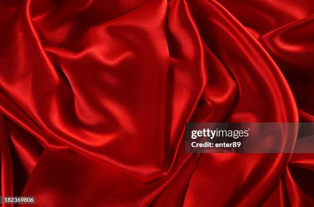 rote satin hintergrund - satin stock-fotos und bilder