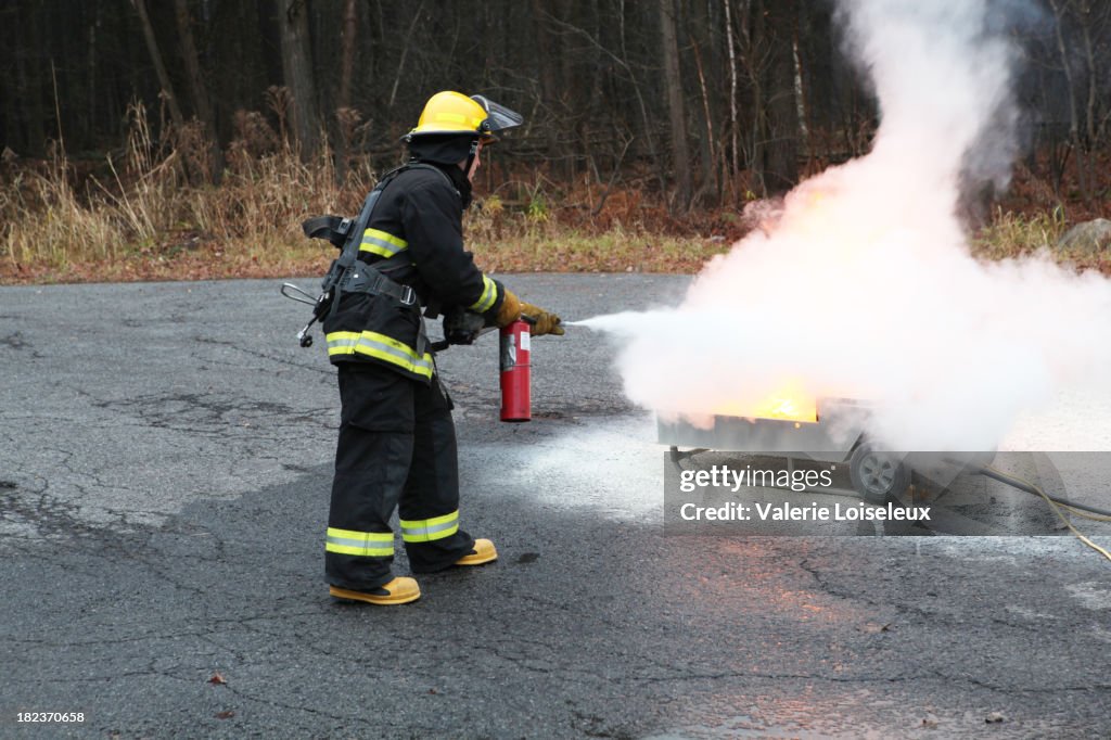 Fireman with Fire Extinguisher