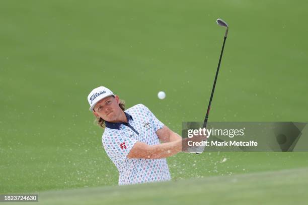 Cameron Smith of Australia plays a shot from the bunker on the 10th hole during the ISPS HANDA Australian Open at The Australian Golf Course on...