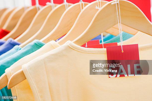 clothing with sale price tag label, fashion discount retail shopping - hanging clothes stock pictures, royalty-free photos & images