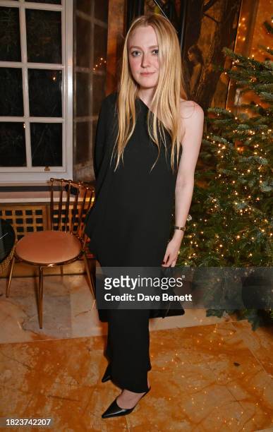 Dakota Fanning attends a star-studded night celebrating Edward Enninful's Trailblazer award, hosted by Natasha Poonawalla on December 4, 2023 in...