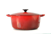 Red casserole dish on white background