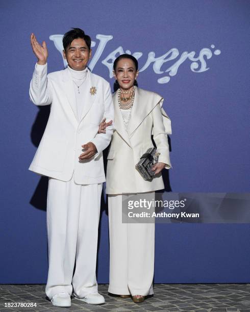 Chow Yun Fat and Jasmine Tan attends the Louis Vuitton Menswear Pre-Fall 2024 show on November 30, 2023 in Hong Kong, China.