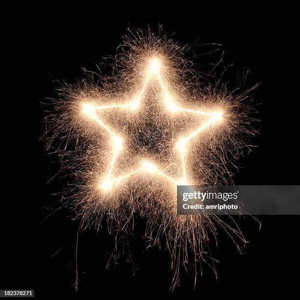 sparkling star - sparklers stock pictures, royalty-free photos & images