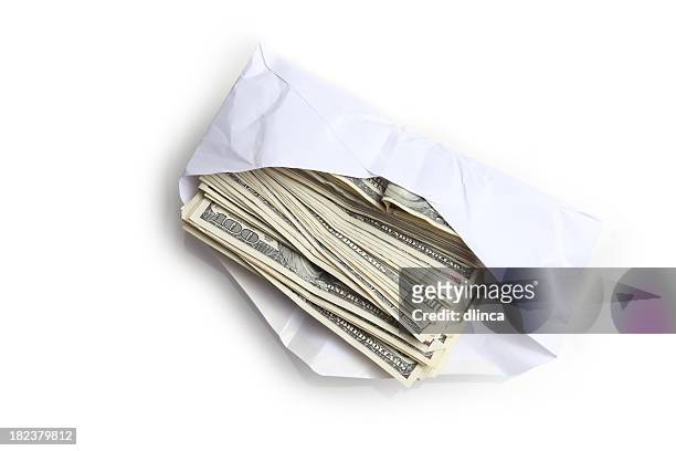 envelope filled with stack of hundred dollar bills - bribing stockfoto's en -beelden