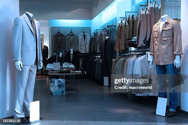 clothing store with various men clothing and suits - haute couture stock pictures, royalty-free photos & images