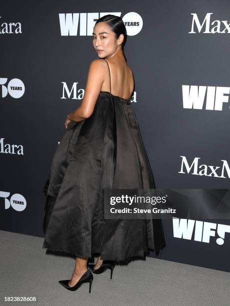 Greta Lee arrives at the Women In Film Presents 2023 WIF Honors at The Ray Dolby Ballroom on November 30, 2023 in Hollywood, California.