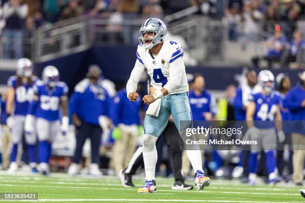 Dak Prescott of the Dallas Cowboys celebrates after passing for a touchdown during an NFL football game between the Dallas Cowboys and the Seattle...