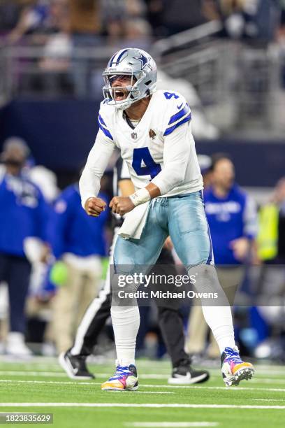 Dak Prescott of the Dallas Cowboys celebrates after passing for a touchdown during an NFL football game between the Dallas Cowboys and the Seattle...